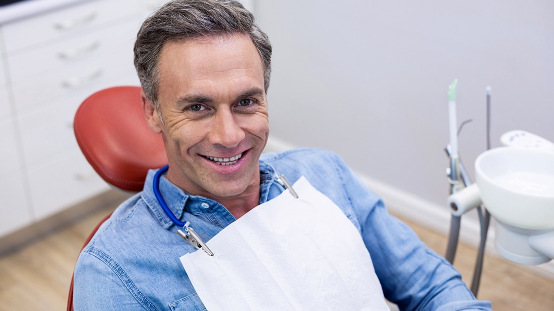 Patient in Dental Chair Smling