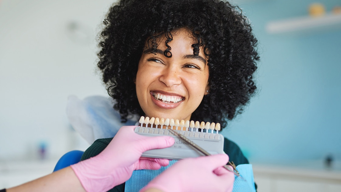 Woman Smiling in Dental Chair