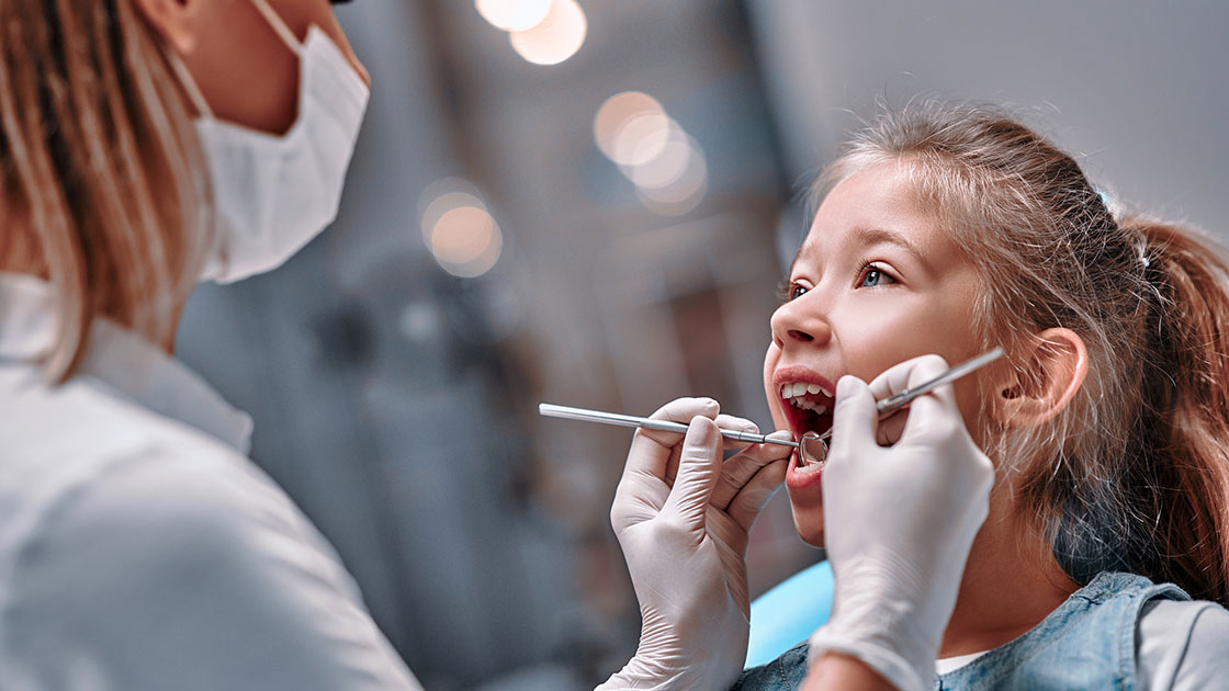 Child with Dentist Photo